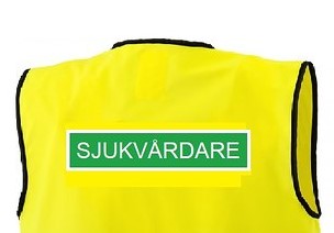 SJUKVÅRDARE Reflexväst  gul med grön platta och vit text SJUKVÅRDARE    - 2