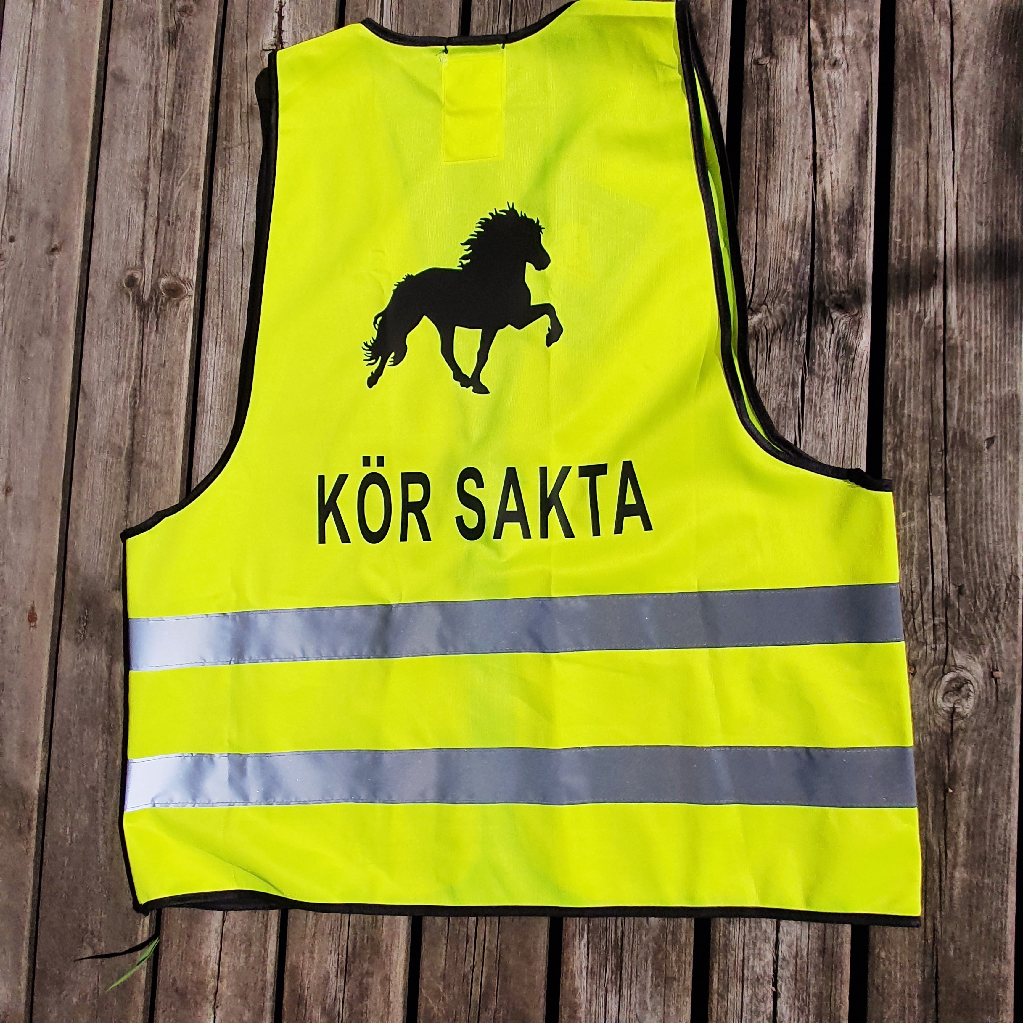 Reflexväst gul med tryck islandshäst  text KÖR SAKTA. i svart tryck