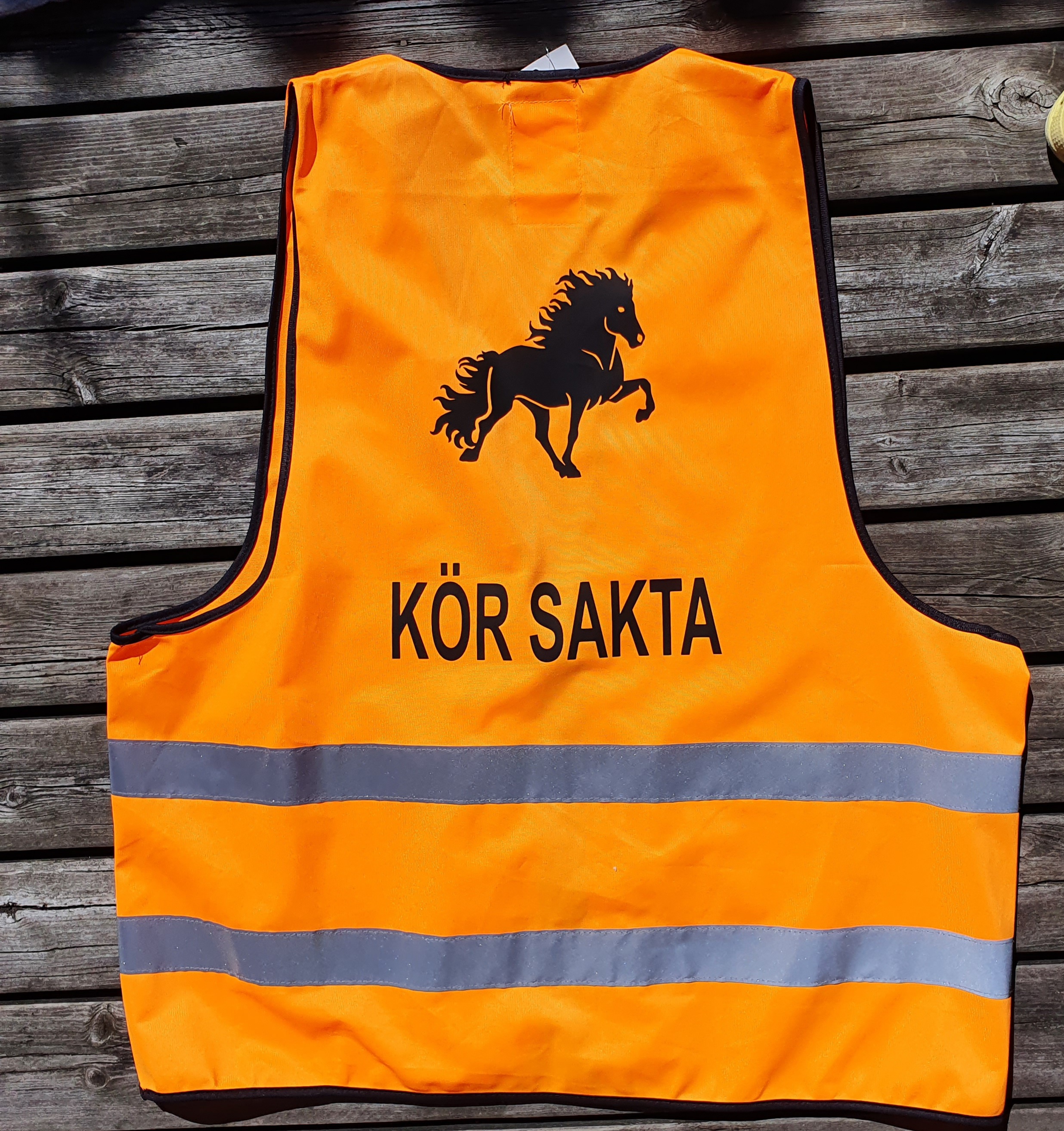  Reflexväst orange med islandshäst + text KÖR SAKTA