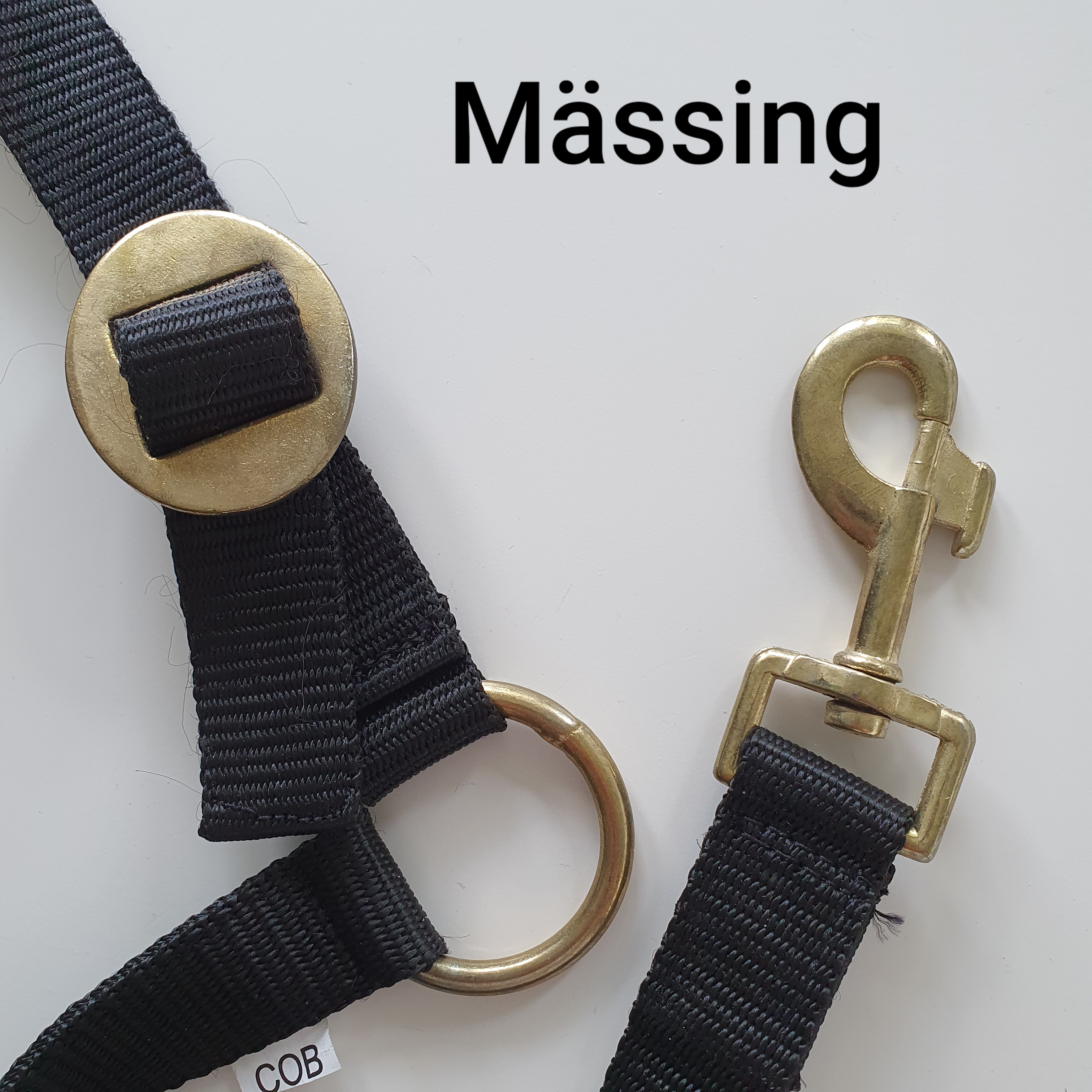 E Grimma brodyr med mässing