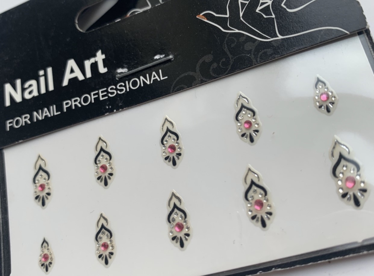 Med rosa rhinestones