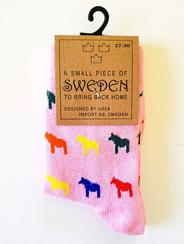 Barnstrumpor med Dalahästar rosa