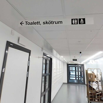 Takhängd skylt