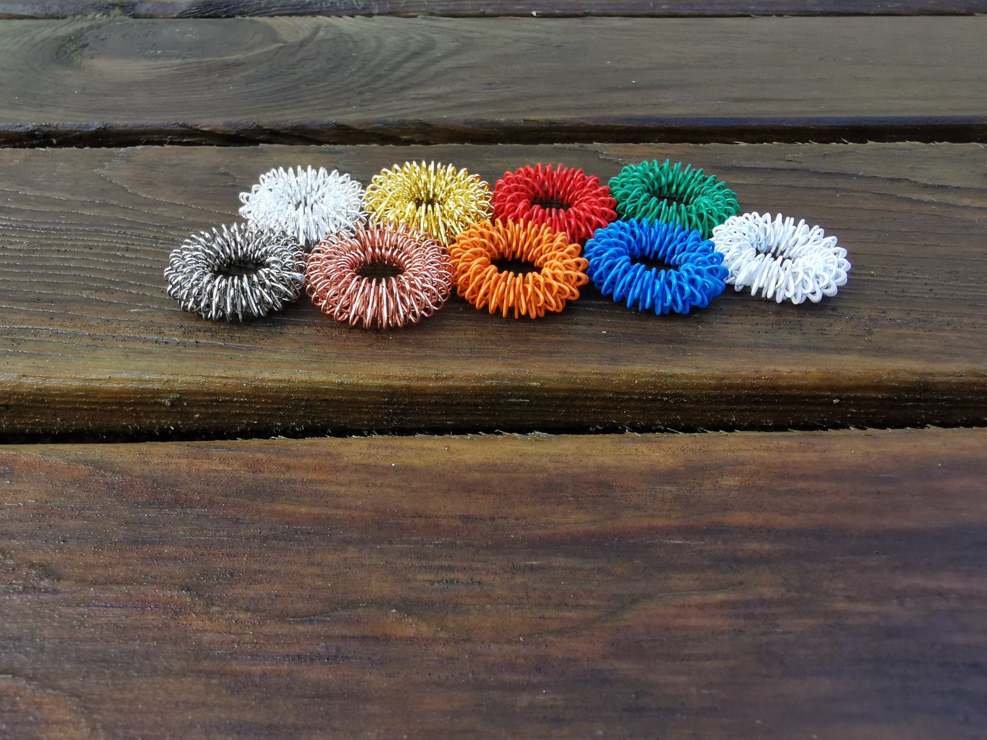 Fingermassagering, Fingerrullare,  Akupressurring