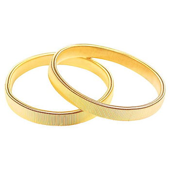 Ärmhållare i guld.