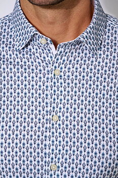 Skjorta i jersey slim fit. Märke  DESOTO, vit med mönster
