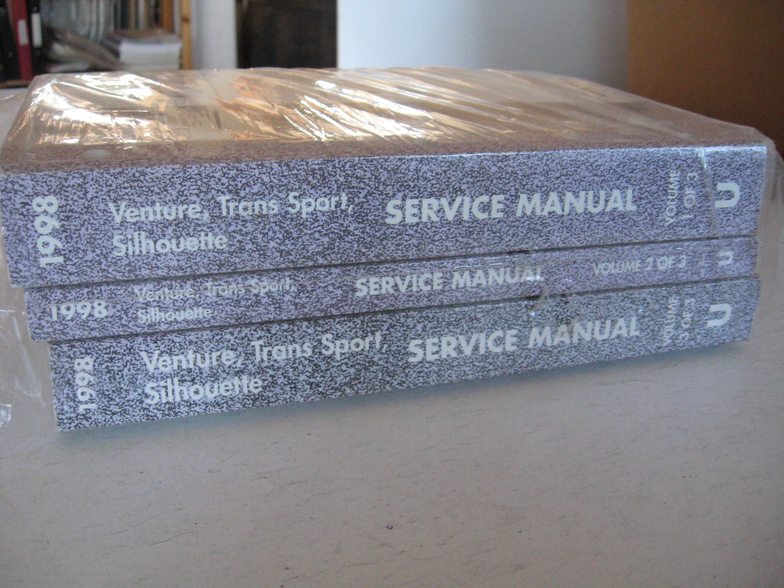 1998 Chevrolet Venture + Pontiac Trans Sport + Oldsmobile Silhouette Service Manual Set om 3 Böcker