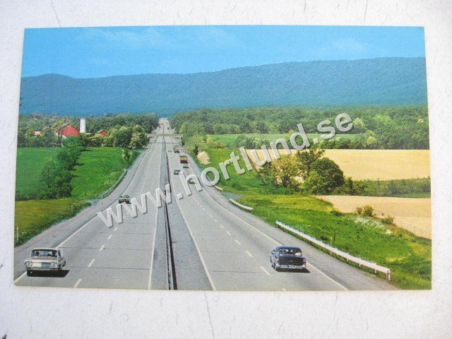 1964 Chevrolet Vykort Between Carlisle and blue Mountain the 14-mile straightaway of the Pennsylvania Turnpike is a ribbon of beauty