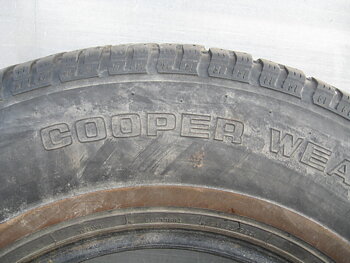 235/75R15 Cooper Weathermaster vit rand