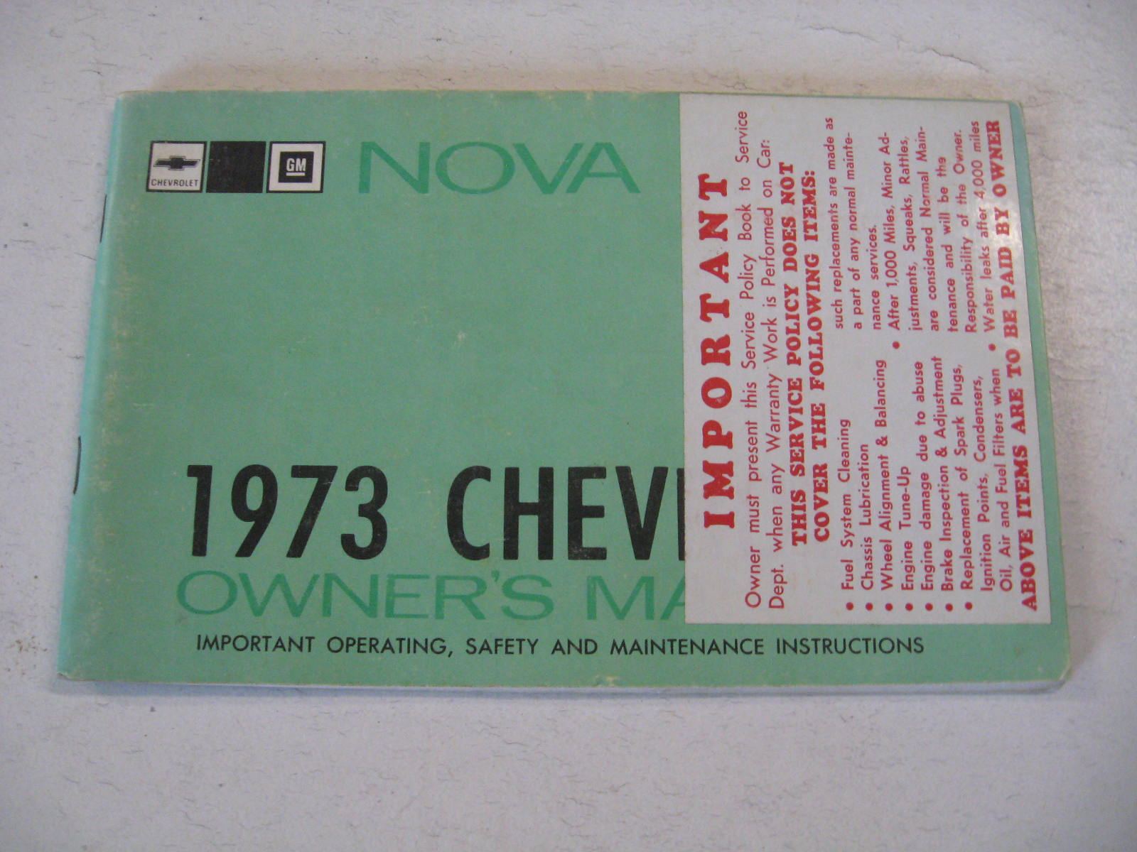1973 Chevrolet Nova Owners Manual med service meddelande på omslaget