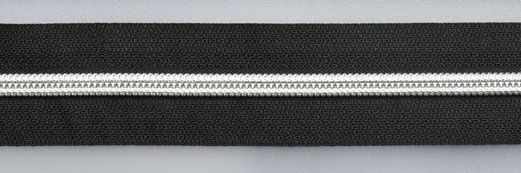 Dragkedja 6 mm spiral, "Metall-lock" svart/silver, metervara