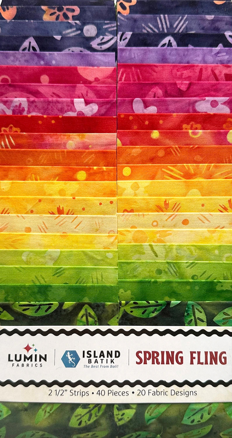 Jellyroll - "Spring Fling" , 40st 2½" x 42 strips" - 2st remsor av varje tyg.