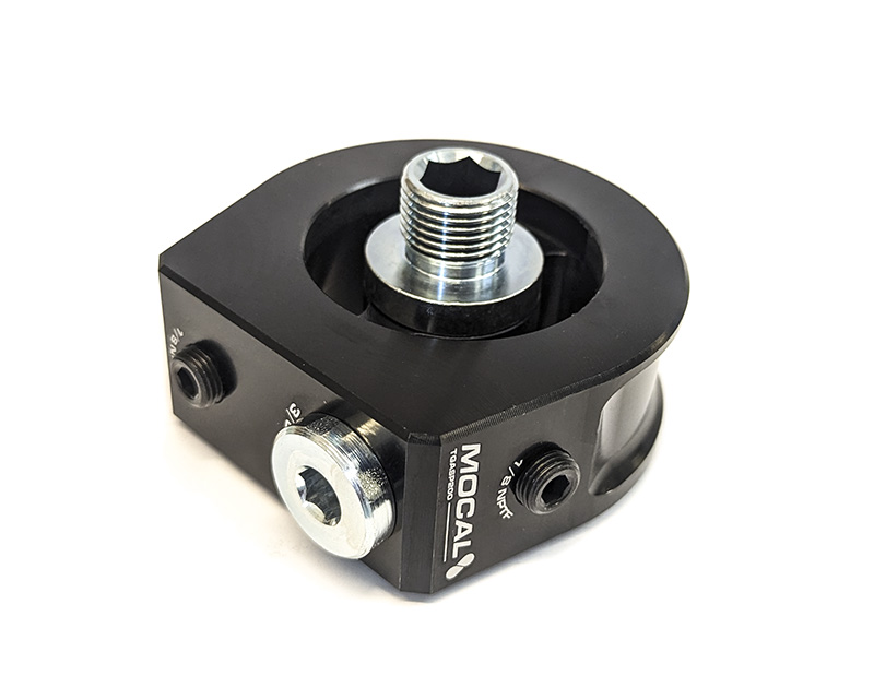 Sandwich plate between engineblock and oilfilter 2 x 1/8" + 1 x 3/8" outlet