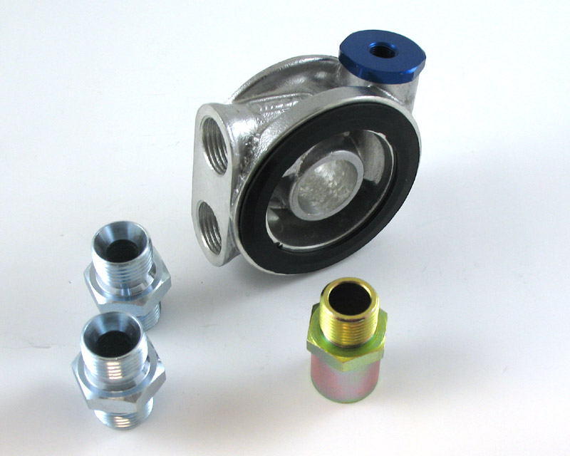 Adapter mellan motorblock och oljefilter 1/8" uttag