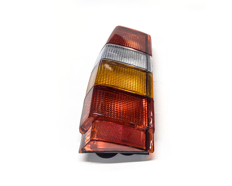Tail lamp Left - yellow indicator 745/945 