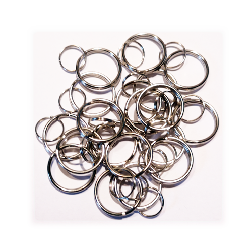 Nyckelring, ca 20mm diameter.