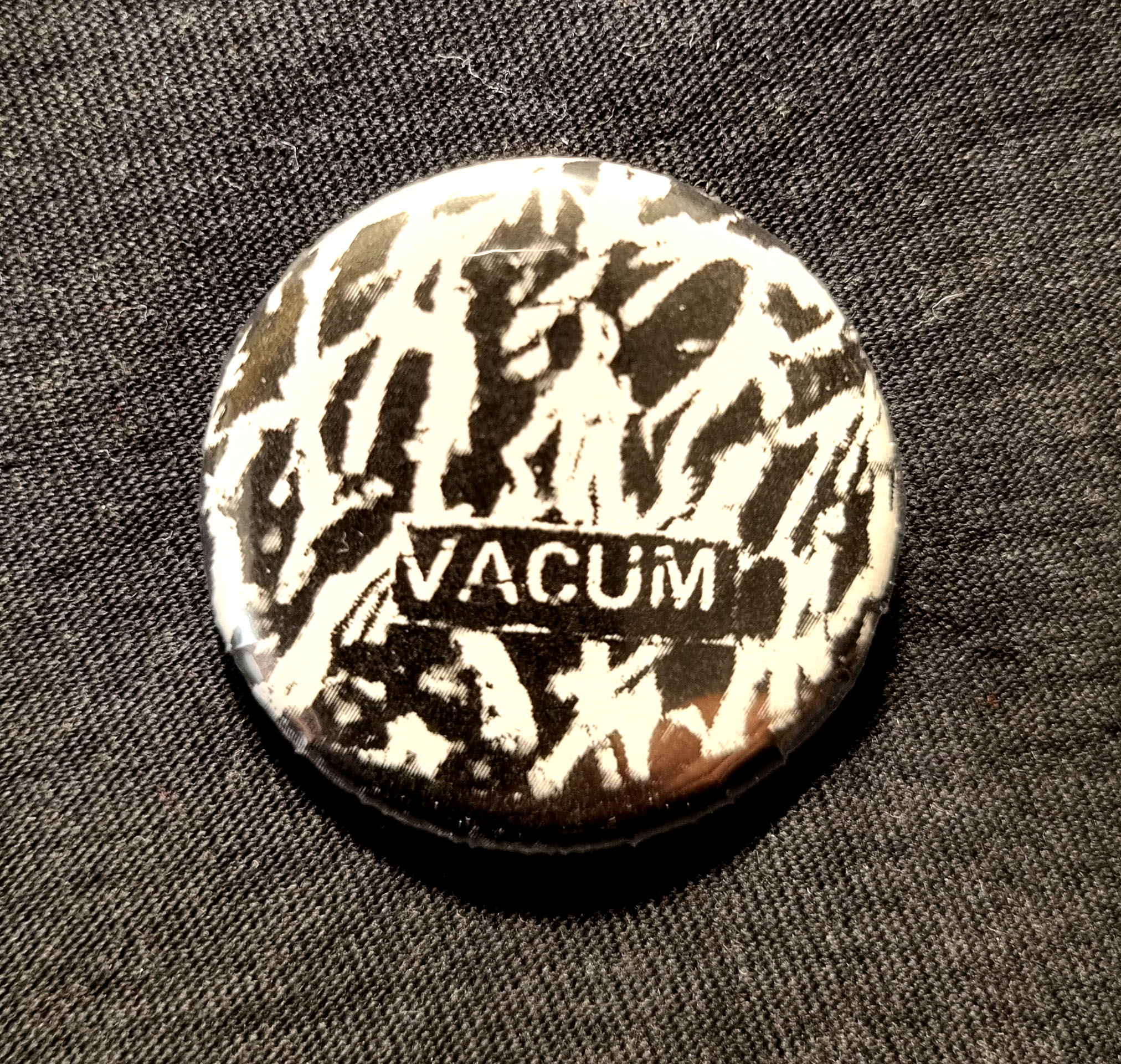 VACUM - badge 4