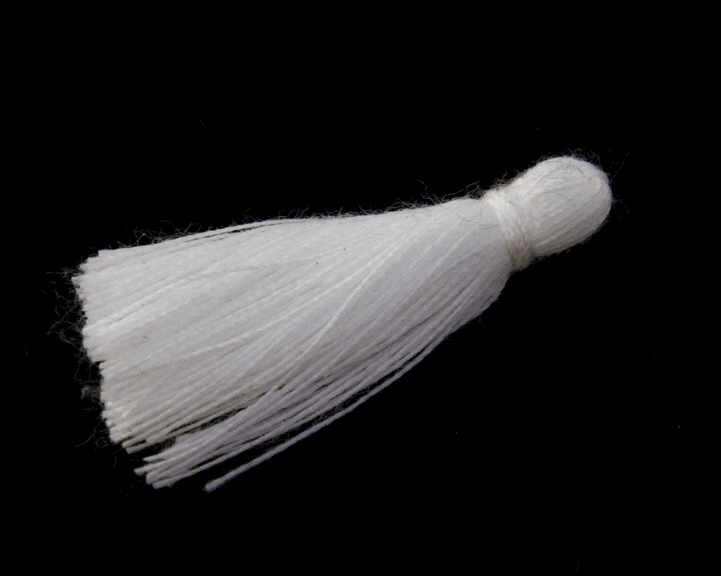 Tassel i bomuld