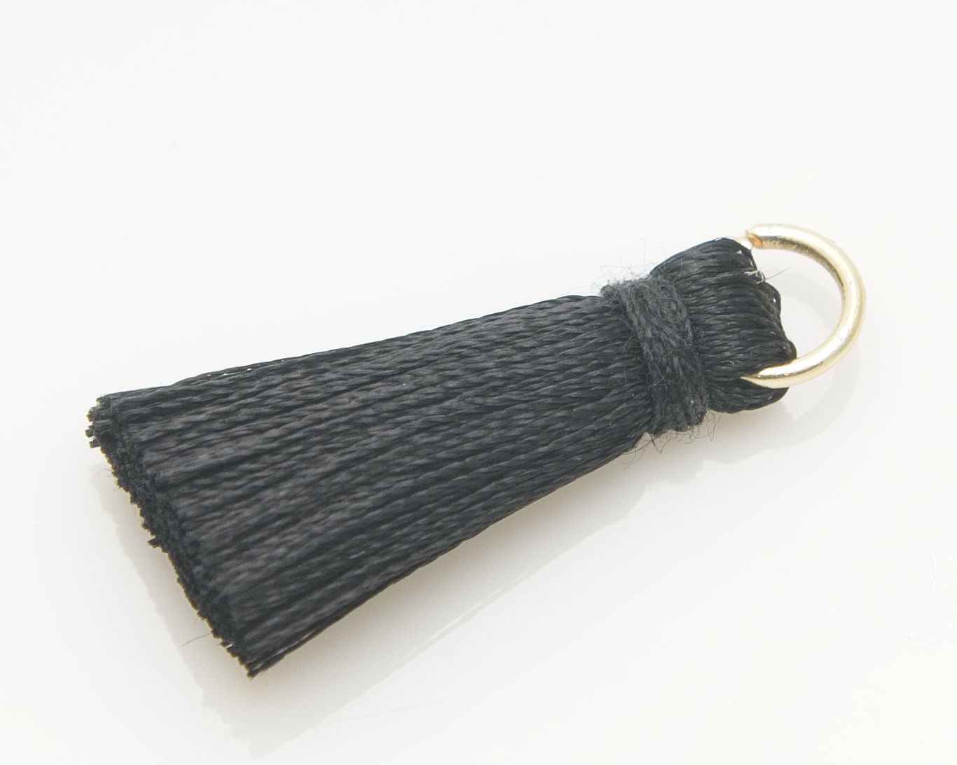 Mini tassel svart
