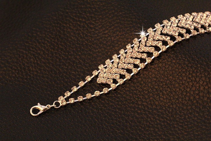 Armband med ett band av Austrian Crystals och i 18 K Guldplätering - 4
