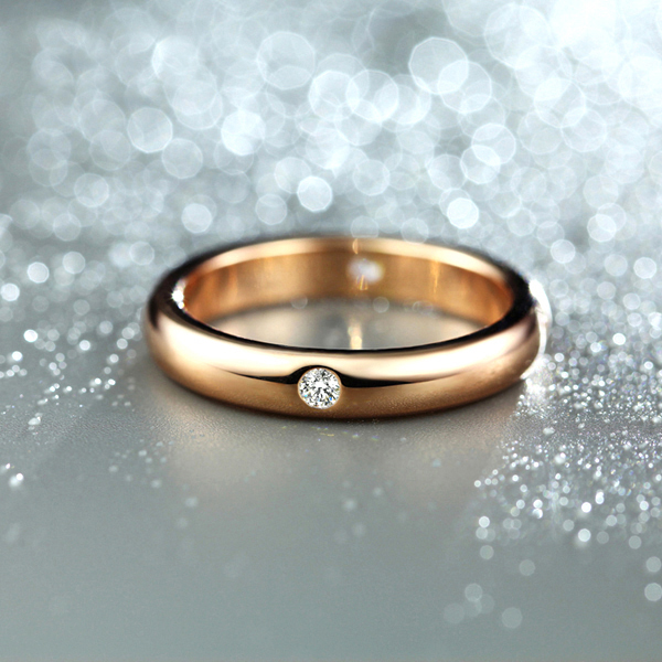 Ring med fyra integrerade stenar i Cubic Zirconia samt i 18 K Roséguldplätering - 2