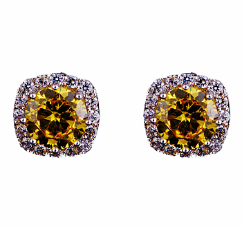 Örhängen med flera små vita Cubic Zirconia och en större Cubic Zirconia i Gult samt i 18 K Vit Guldplätering