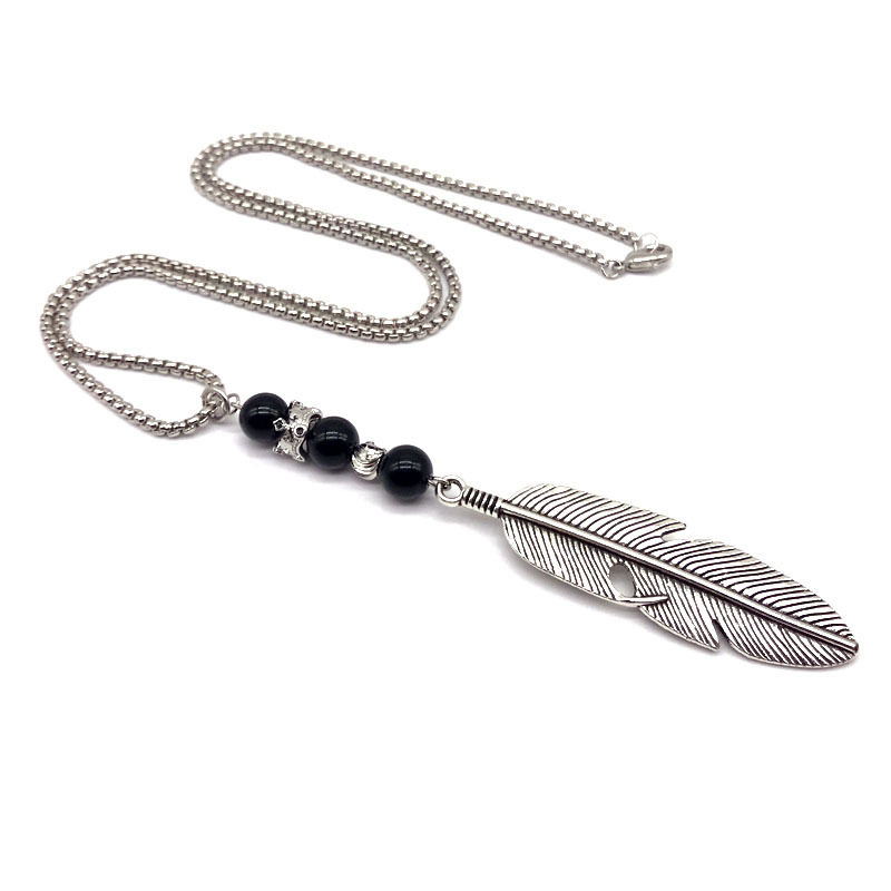 Halskedja "Feather" i rostfritt stål  och med detaljer  i 925 Sterling Silverplätering och pärlor - 3