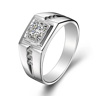 Stilren ring i herrmodell med en större och 6 mindre Cubic Zirconia i platinumplätering