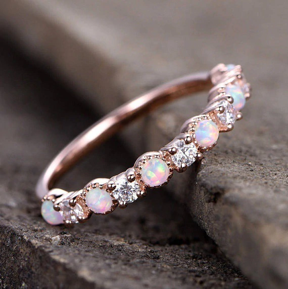 Ring  med små rosa Opalstenar och Cubic Zirconia i 18K Roséguldplätering