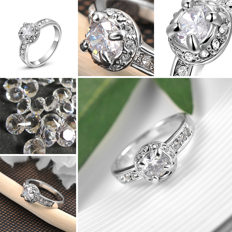 Ring med en stor och många små stenar i Austrian Crystals och Platinumplätering - 2