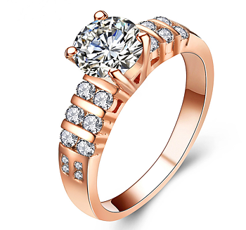 Ring med många små  och en större Cubic Zirconia samt i 18K Roséguldplätering