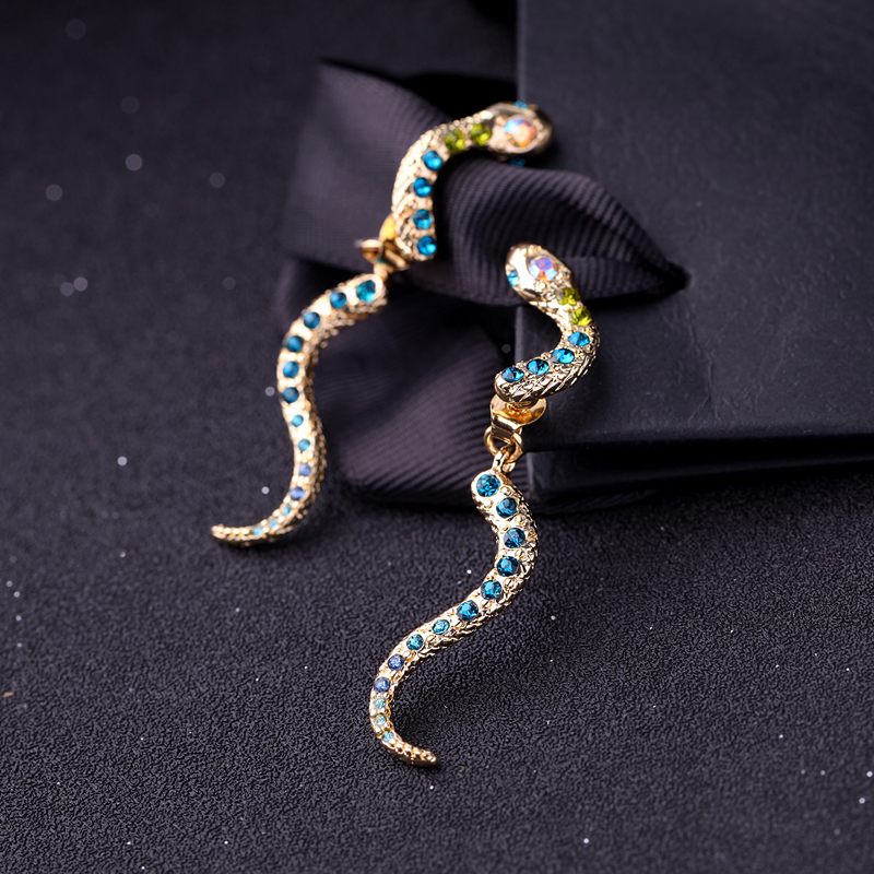 Örhängen "Crystal Snake" i guldfärg och blå kristaller - 5