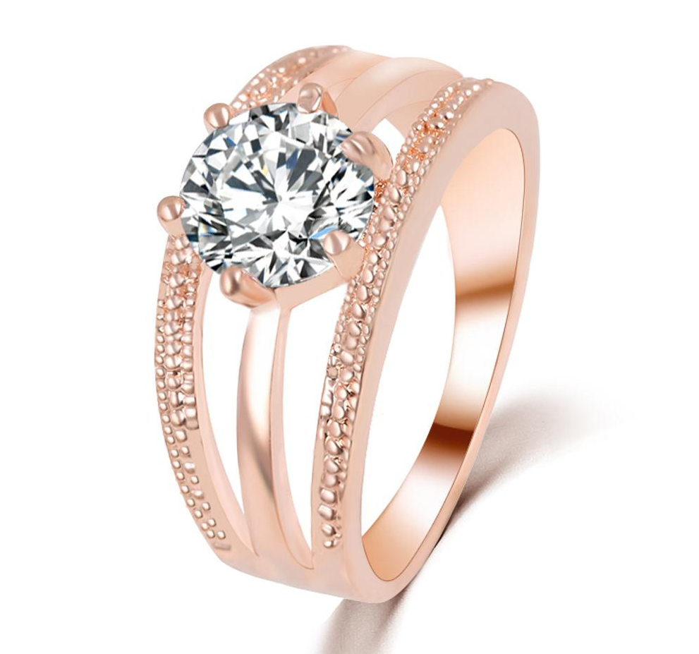 Ring med små Cubic Zirconia i 18K Roséguldplätering