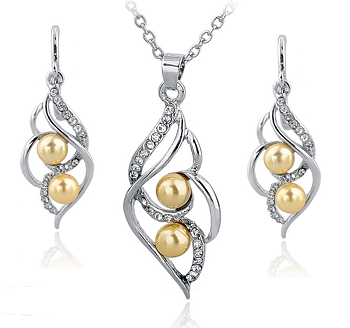 Smyckeset med Austrian Crystals och Simulated Pearls - 925 Sterling Silverplätering och gula Pärlor