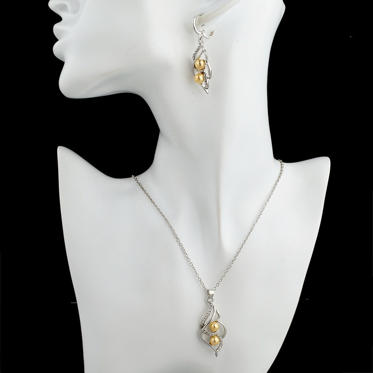 Smyckeset med Austrian Crystals och Simulated Pearls - 925 Sterling Silverplätering och gula Pärlor - 2