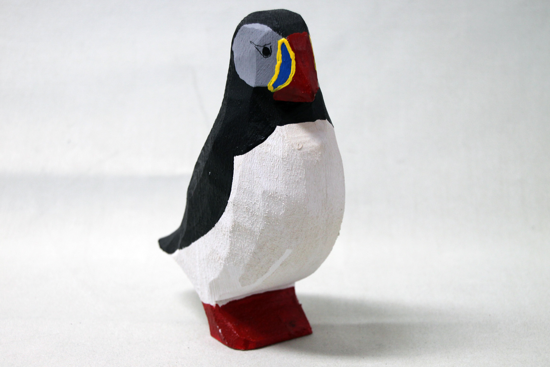 Puffin in wood