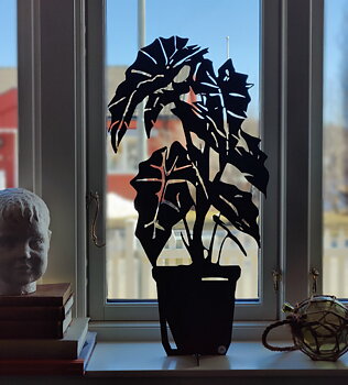 Skelettblomma svart från Älska plåt