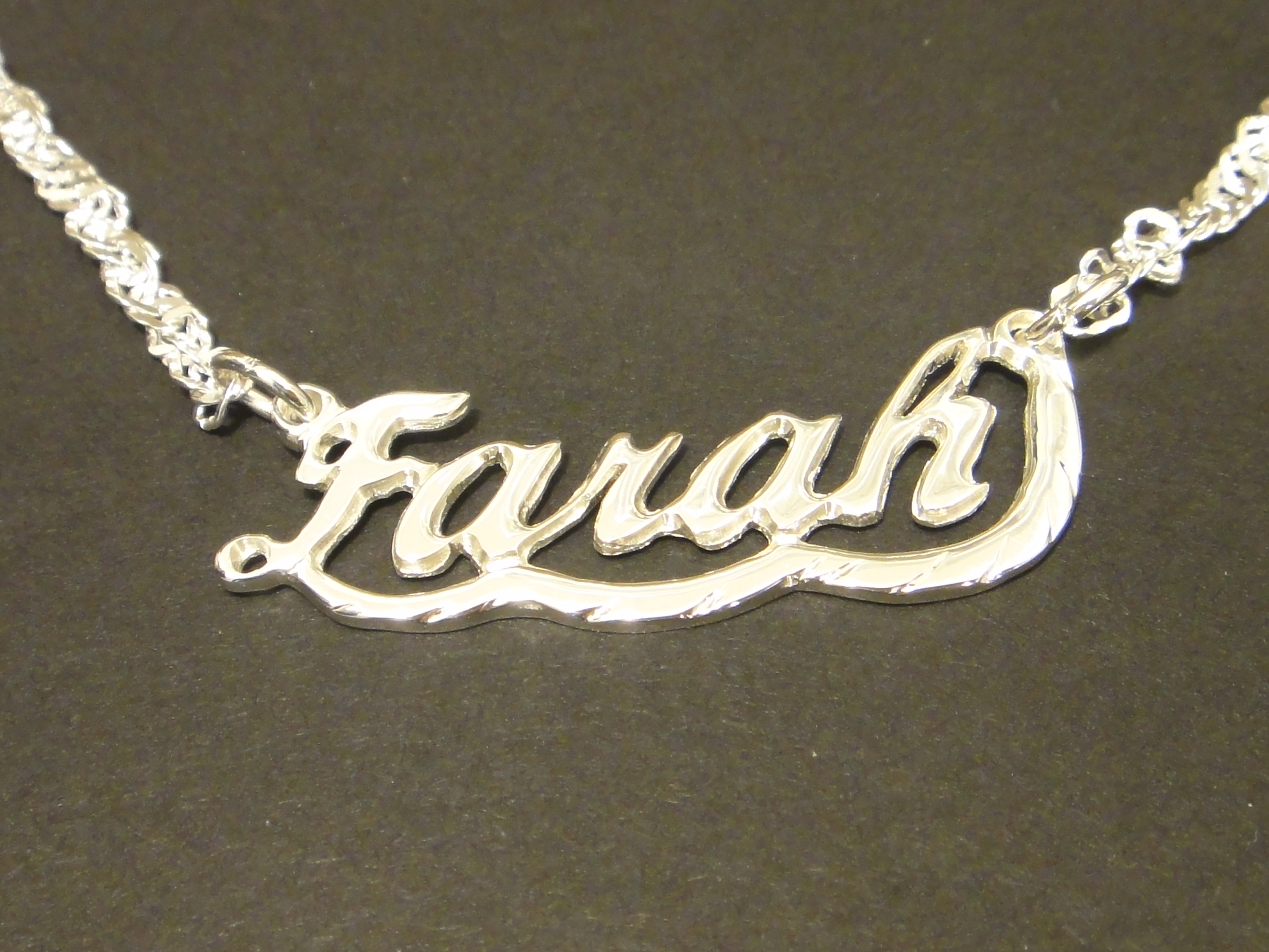 Namn i guld 18k / silver