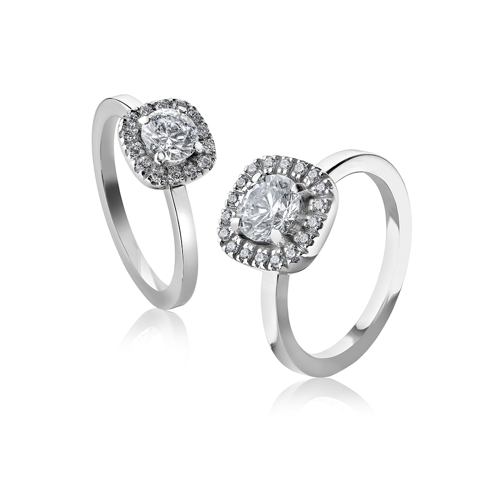 9110-2K Sten: 1×1,0 ct & 18×0,01 ct Fattning: CARM fyrkantig 6  mittsten 0,40 ct
