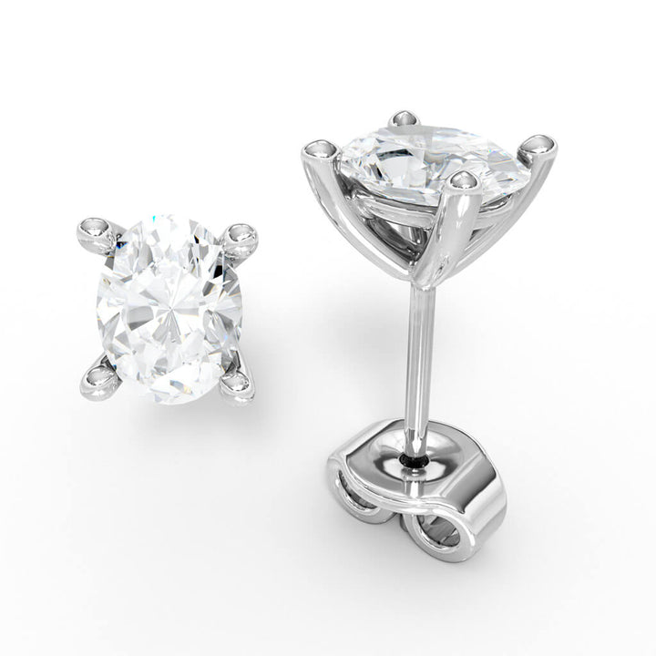 AURE 19S - Studs Oval Sapphire 1,00 i vitguld