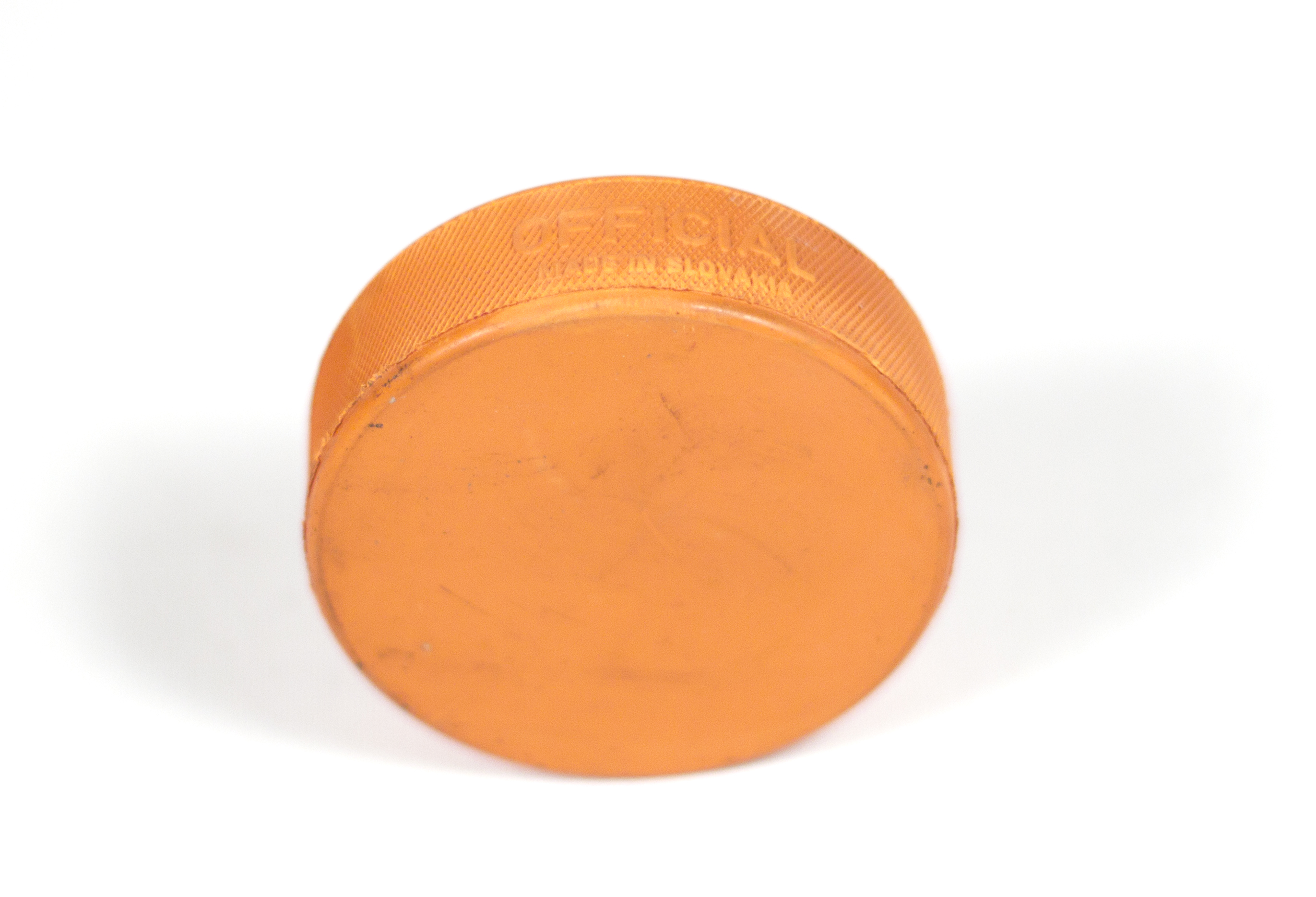 Weighted puck