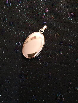 Medaljong för kort.18K guld. 1973.Göteborg