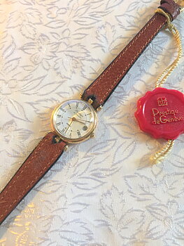 -Armbandsur Prestige de Geneve  18 K Guld.  Quartz med datum. Batteriverk.  