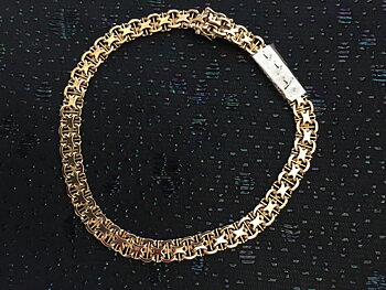 Armband i 18 karat guld.Design: X Länk.Tillverkad 1967