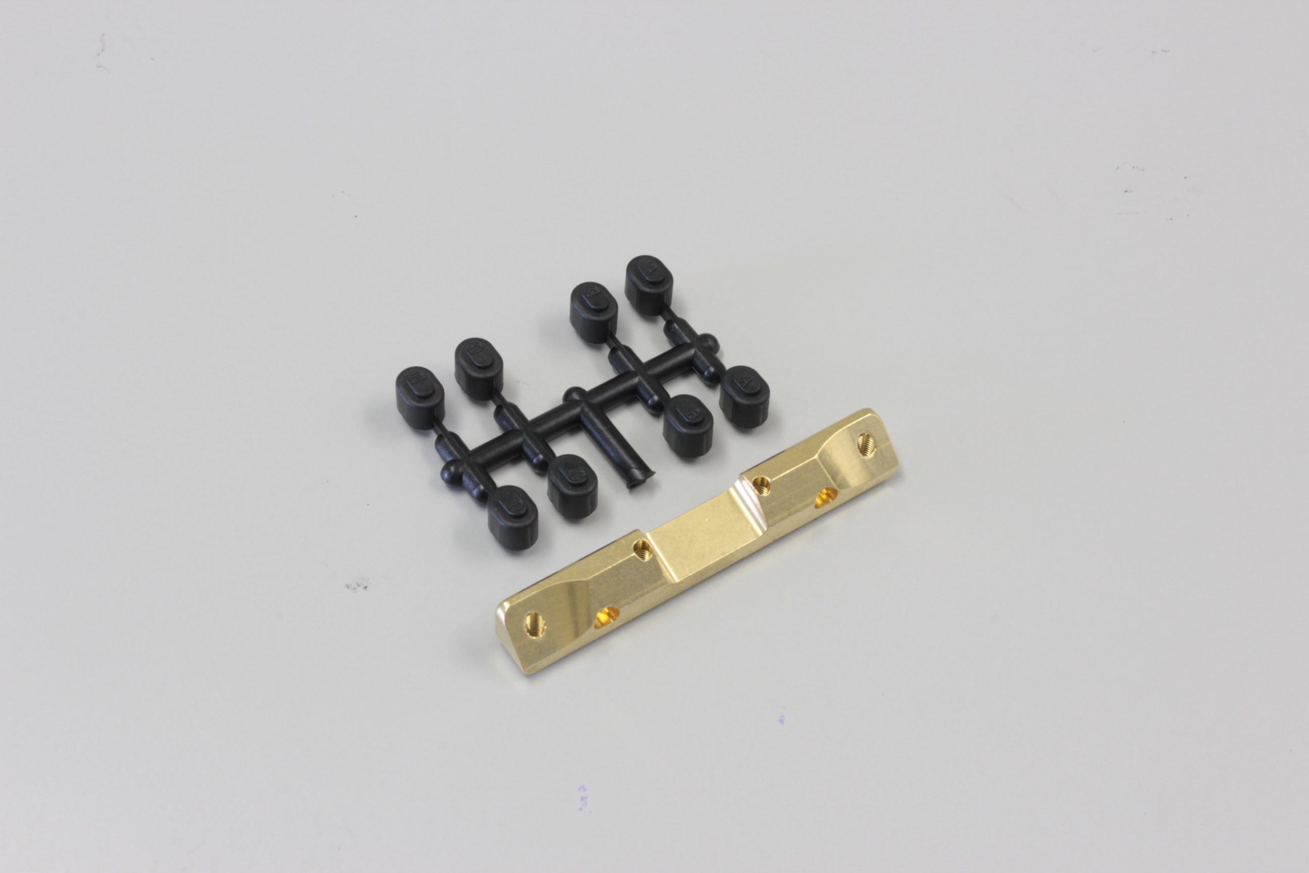 Kyosho UMW725B SUSPENSION HOLDER RB6-RB7-SC6-RT6 (RF-MID MOTOR) - BRASS