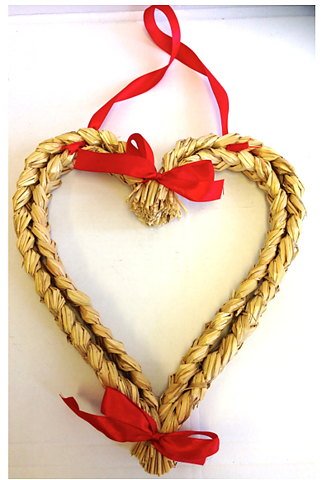 Hanging straw heart with red ribbon 25 cm