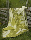Flowers grön 130x180 jaquardvävd ullpläd