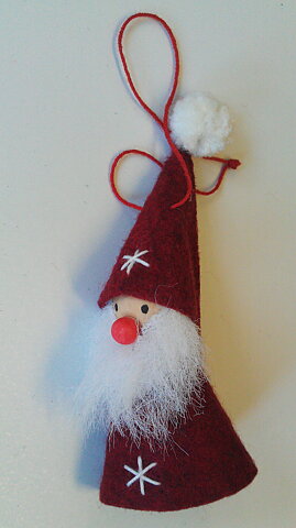 Tomte filtad hängande med stjärna