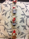 Little santas on a ladder