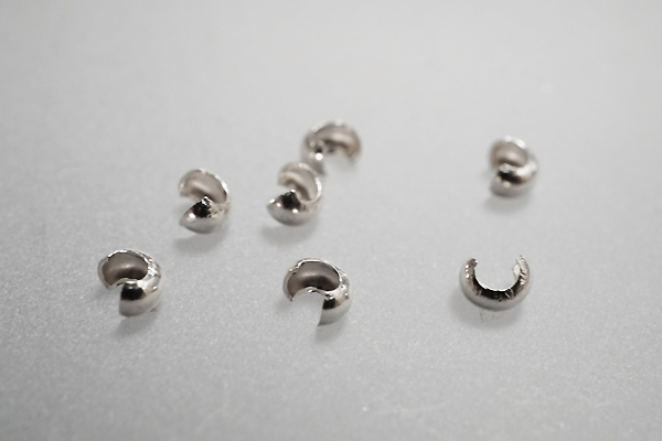 Klämtubskåpa 2,4 mm 10st/fp. Pris/fp, 925-silver